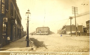 Real photo postcard (RPPC) of Sarah & Chouteau Ave. in St. Louis, Missouri. The "X" marks where the pharmacy is.