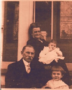 Francis and Lena (O'Brien) Helbling with their grandchildren, Edgar and Anna May Helbling.