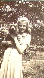 Mary T. Helbling as a young teen with one of the family's cocker spaniels, c late 1930s.