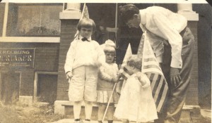 From left: Edgar B. Helbling, (Anna) "May" Helbling, Vi Helbling, and Gerard William Helbling, on Flag Day 1914.