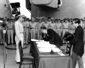 "Shigemitsu-signs-surrender" by Army Signal Corps - Naval Historical Center Photo # SC 213700. Licensed under Public domain via Wikimedia Commons. 02 Sep 1945 aboard USS Missouri.