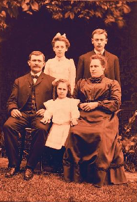 George Anthony Roberts with his wife Ella V. Daniel Roberts and their three children: Ethel Gay Roberts standing in back on left, George Anthony Roberts, Jr. standing on right, and little Edith Mae Roberts between her beloved parents, circa 1904.