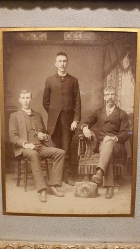 The sons of William Roberts and Sarah Christie Roberts, from left: Isaac H. Roberts, George L. Roberts standing, and John W. Roberts on right.