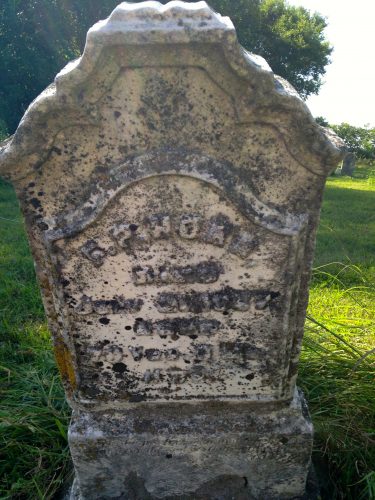 Tombstone of Frederick P. Horn in Sandhill Cemetery, Cedar County, Iowa, in August of 2015. Note deterioration of stone.
