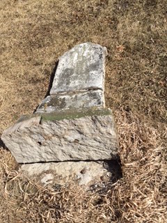 Tombstone of Frederick P. Horn in Sandhill Cemetery, Cedar County, Iowa, after strong winds blew through the cemetery in March, 2016.